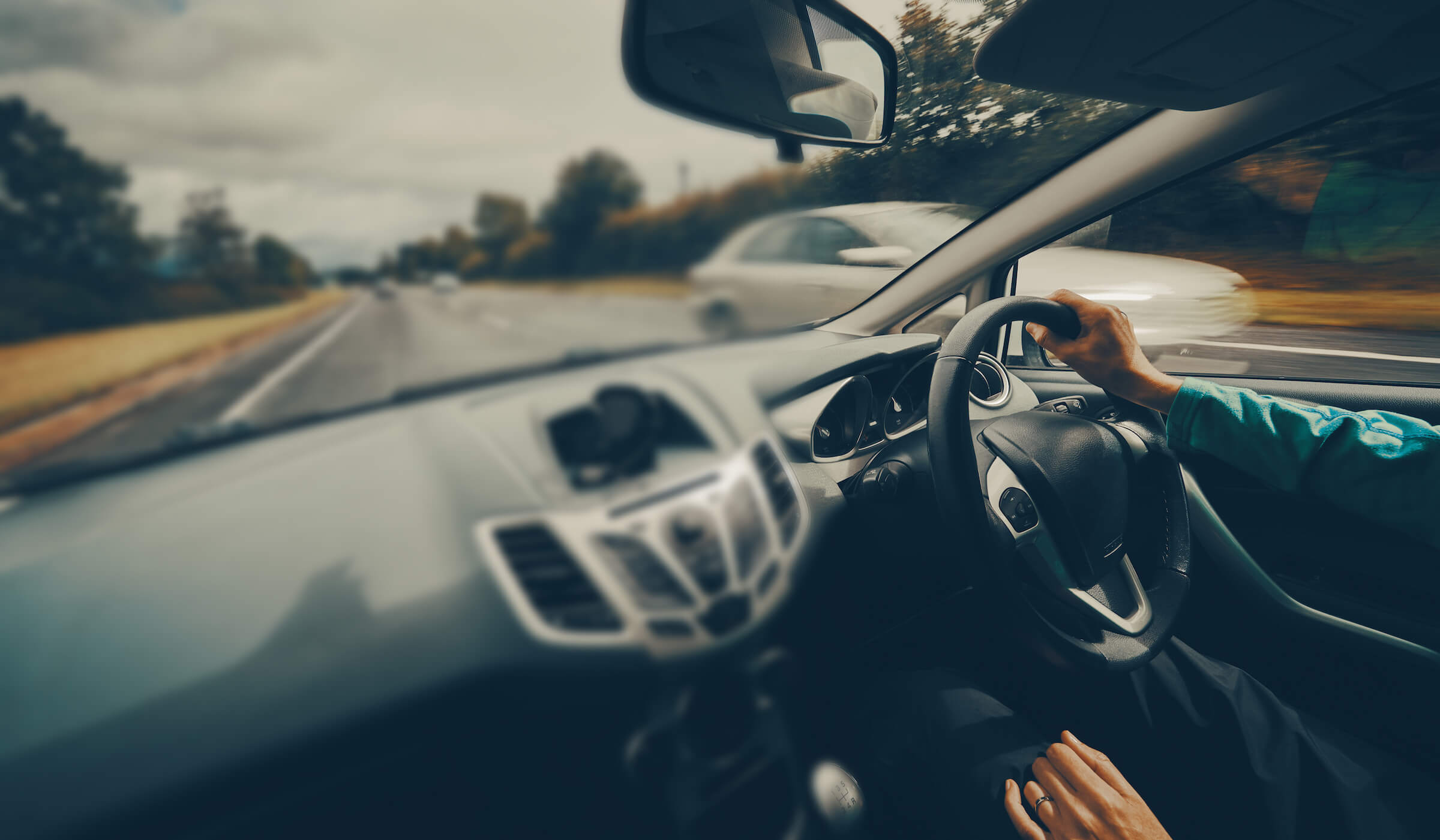 Learner driver operating a dual control car